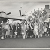 New York City Ballet on tour waving in front of B.O.A.C. airplane