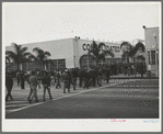 Workmen entering Consolidated Aircrafts early in the morning. San Diego, California