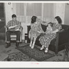 Construction workman, his sister and her little girl in rented house. San Diego, California. They live together. He supports all three