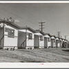 Tourist court which caters to employees of defense industries. San Diego, California. Rental fees at these courts are from five to ten dollars a week, usually eight dollars, and include small room, bath and kitchenette equipped with two burner gas plates