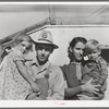 Family of carpenter's helper who lives in their trailer. Corpus Christi, Texas