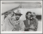 Family of carpenter's helper who lives in their trailer. Corpus Christi, Texas