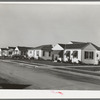 Houses in the Alameda residential section of Corpus Christi, Texas. These houses are about two years old and were built by people who came into Corpus Christi because of the oil boom, sea wall construction work, etc