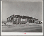 New school under construction in the North Beach section of Corpus Christi, Texas. This section has been the center of tourist housing and has now been taken over by the workmen of the naval air base