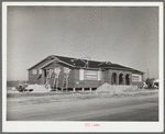 New school under construction in the North Beach section of Corpus Christi, Texas. This section has been the center of tourist housing and has now been taken over by the workmen of the naval air base