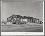 New school under construction in the North Beach section of Corpus Christi, Texas. This section has been the center of tourist housing and has now been taken over by the workmen of the naval air base