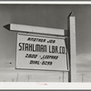 Lumber company sign. Corpus Christi, Texas. Naturally all forms of construction work are on the increase in the town
