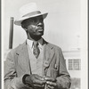 Workman at the naval air base. Corpus Christi, Texas. Notice his identification badge which allows him to enter base. Picture taken on Sunday