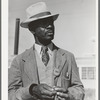 Workman at the naval air base. Corpus Christi, Texas. Notice his identification badge which allows him to enter base. Picture taken on Sunday