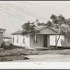 Shotgun type of house occupied by workman and his family. Corpus Christi, Texas. This is the better type of housing in one of the cheapest residential sections