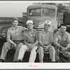 Four truck drivers who work at the naval air base now under construction. Corpus Christi, Texas