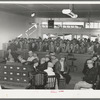 Men applying for work at the office of the Texas State Employment Service, Corpus Christi, Texas. In Corpus Christi there is now surplus supply of unskilled labor and a shortage of skilled labor