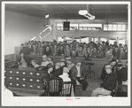 Men applying for work at the office of the Texas State Employment Service, Corpus Christi, Texas. In Corpus Christi there is now surplus supply of unskilled labor and a shortage of skilled labor