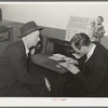 Applicant for employment being interviewed at the Texas State Employment Service office. Corpus Christi, Texas