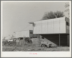 End of apartment house for permanent farm workers at the Yuba City FSA farm workers' camp. Yuba City, California