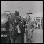 George Balanchine with Lincoln Kirstein and members of New York City Ballet, returning to New York City after performing in England