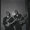 George Balanchine and Lincoln Kirstein, both holding lyres from Orpheus.
