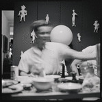 Unidentified image of person at a table on Cakewalk contact sheet.