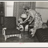 Fruit farmer's wife in her living room. Placer County, California