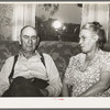 Fruit farmer and his wife, Placer County, California. He owns four hundred acres and has farmed this land for about thirty-five years. He started work in this section freighting ore out. Next he went into cattle raising and about twenty-five years ago int