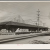 Packing sheds of the Loomis Fruit Association cooperative, forty years in existence. Loomis, Placer County, California
