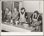 Dishing up dinner for the members of the Loomis Fruit Association cooperative who are holding their fortieth annual meeting. Loomis, California. Placer County