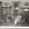 Fruit farmer and his wife in their living room. Placer County, California. These people have raised fruit on four hundred acres for twenty-five years but because of changed market conditions are now heavily in debt to the Federal Land Bank