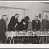Members of the Loomis Fruit Association cooperative sitting down to dinner after their fortieth annual meeting. Loomis, California