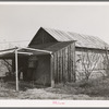 Building of old Virginia City now used as barn. Placer County, California