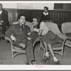 Couple talking at roller skating rink of Savoy Ballroom. Chicago, Illinois