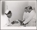 Examining baby at clinic of Negro hospital. Chicago, Illinois