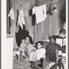 Negro family living in crowded quarters, Chicago, Illinois