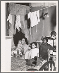 Negro family living in crowded quarters, Chicago, Illinois