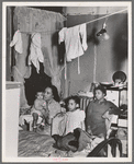 Negro family living in crowded quarters, Chicago, Illinois