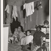 Negro family living in crowded quarters, Chicago, Illinois