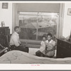 Front room of apartment rented by Negroes. Ida B. Wells Housing Project can be seen through the window. Chicago, Illinois
