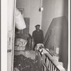 Coal storage in hall of apartment house rented to Negroes. Chicago, Illinois