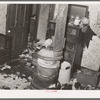 Detail in room of apartment house gutted by fire. This building was formerly rented to Negroes. Chicago, Illinois
