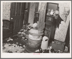 Detail in room of apartment house gutted by fire. This building was formerly rented to Negroes. Chicago, Illinois
