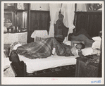 Bedroom in apartment house rented to Negroes. Chicago, Illinois