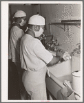 Doctors scrubbing up before operation. Negro hospital, Chicago, Illinois