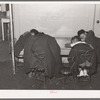 Children sleeping during rest period at Negro nursery. There were not enough beds to go around. Chicago, Illinois