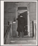 Doctor entering home of relief family. Chicago, Illinois