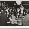 Buying hats in ten-cent store which caters to Negroes. Chicago, Illinois
