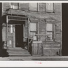 Front of house on Federal Street in Negro section of Chicago, Illinois