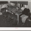 Negro boys during rest period at nursery. There is a shortage of beds. Chicago, Illinois