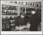 Men's shop which caters to Negroes. Chicago, Illinois