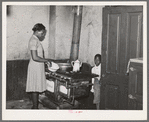 Corner of kitchen of apartment rented to Negroes. Chicago, Illinois