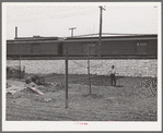 Spring gardening adjacent to railroad tracks in Negro section of Chicago, Illinois