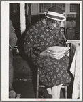 Reading the Bible in the "storefront" Baptist church. Chicago, Illinois